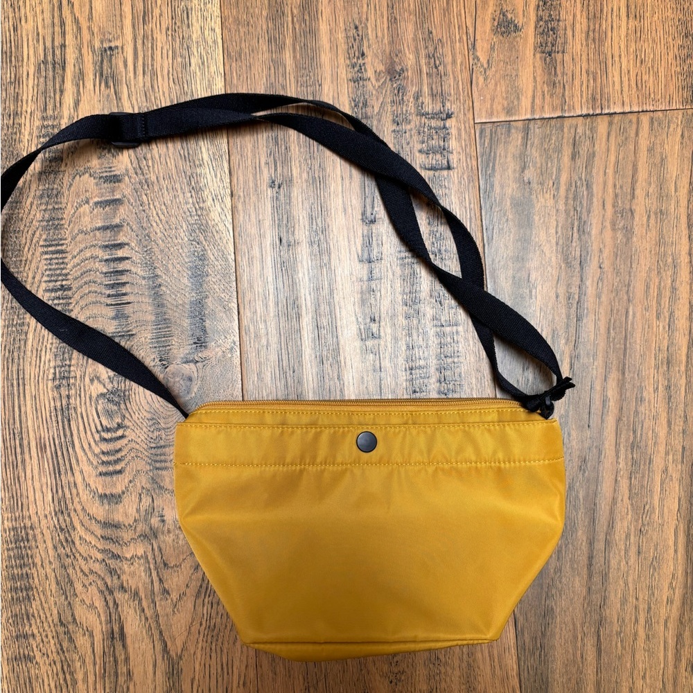 Uniqlo nylon mini shoulder bag in mustard yellow